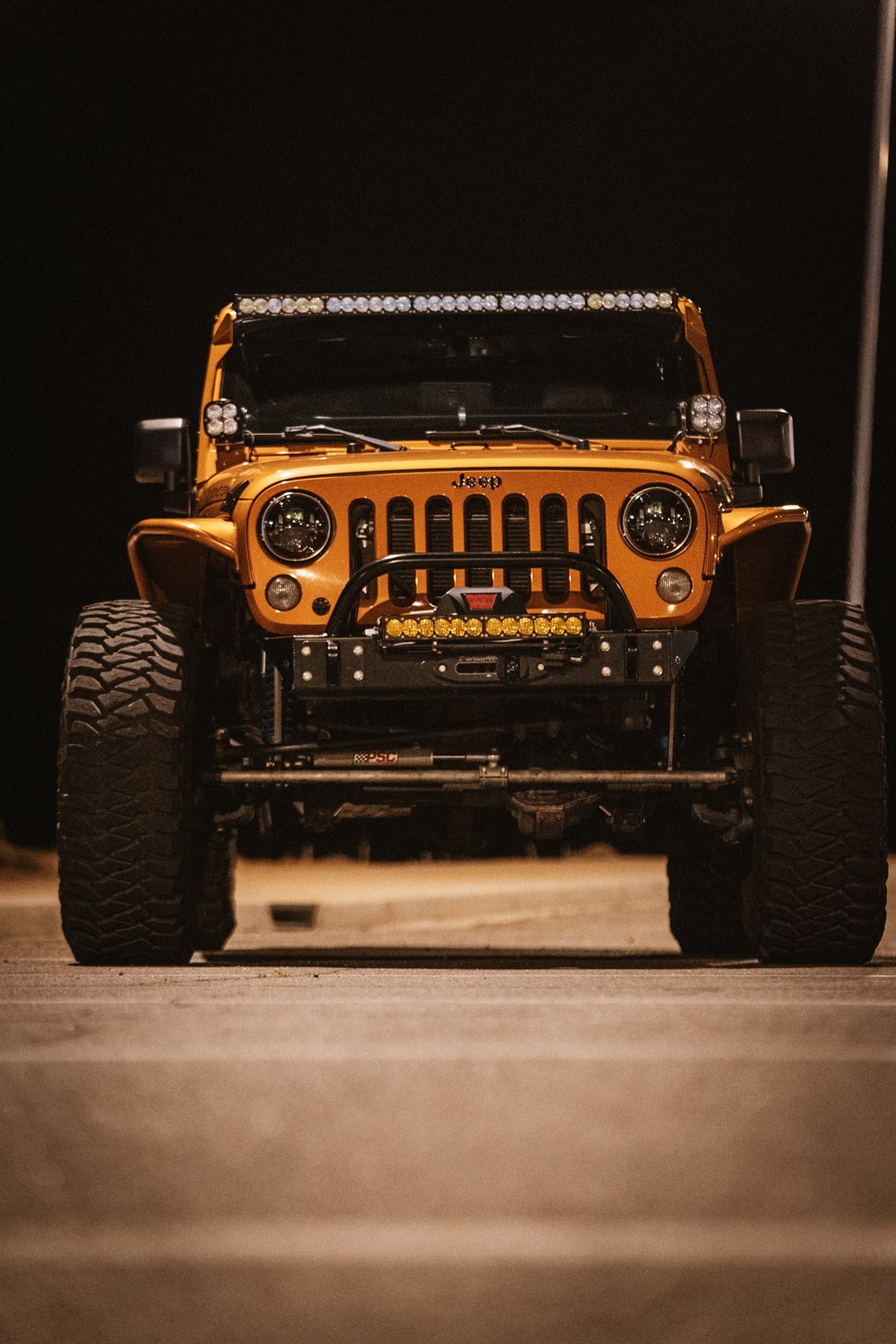 Head-on front portrait with Baja Designs lighting and Warn winch