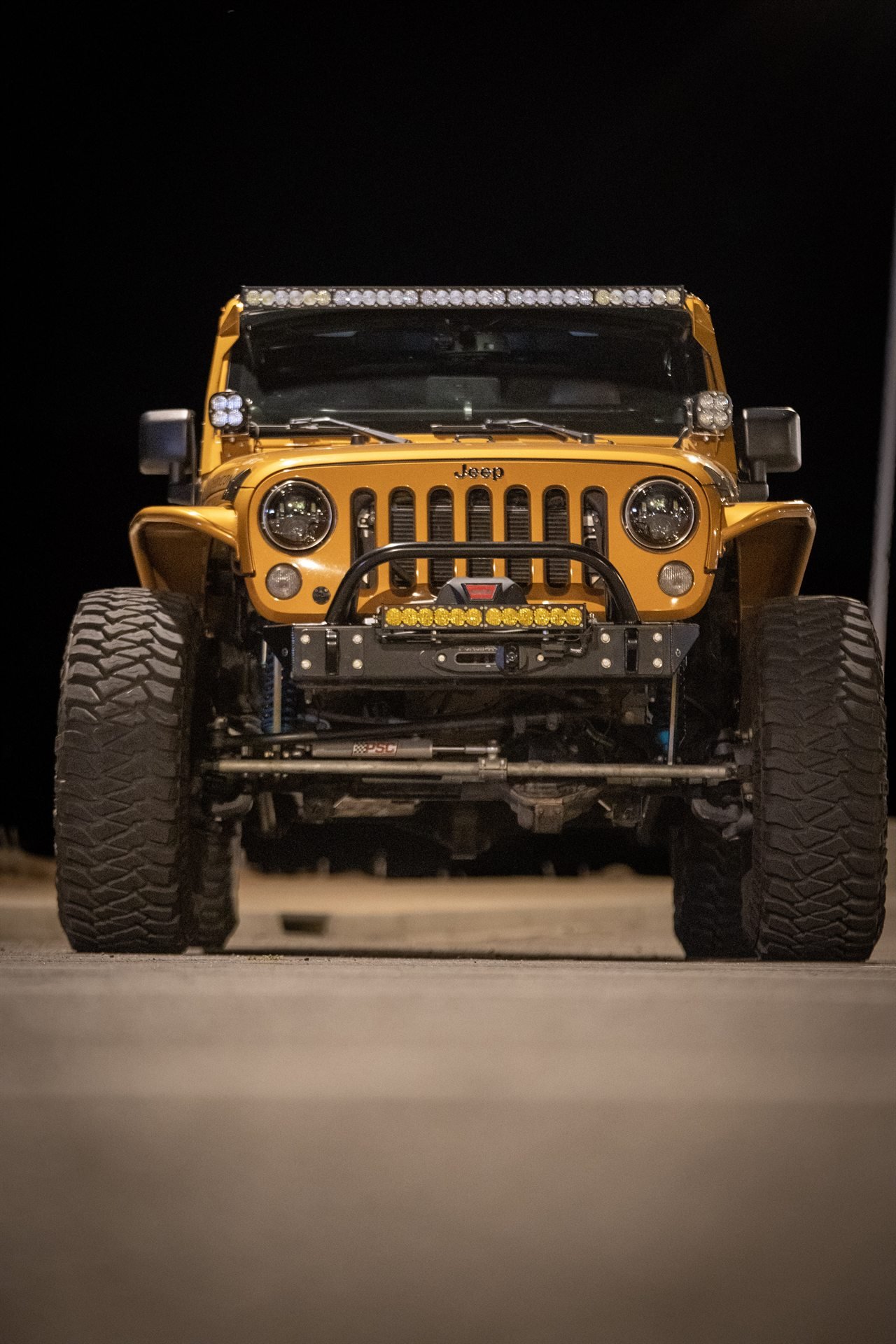 Low front view showing stance and Warn winch